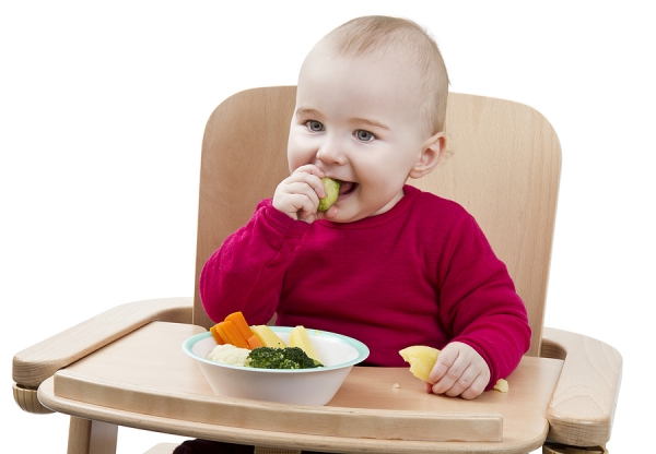 Child Eating Vegetables