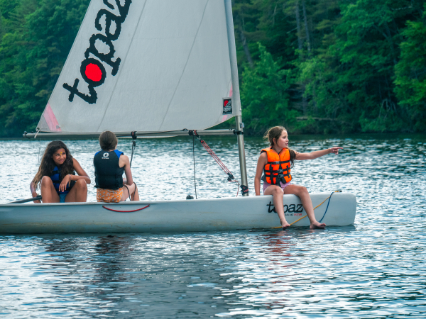 Sailing is a popular waterfront activity. Campers learn to sail on Topaz, Pico, and Bic O'pen Skiff boats.